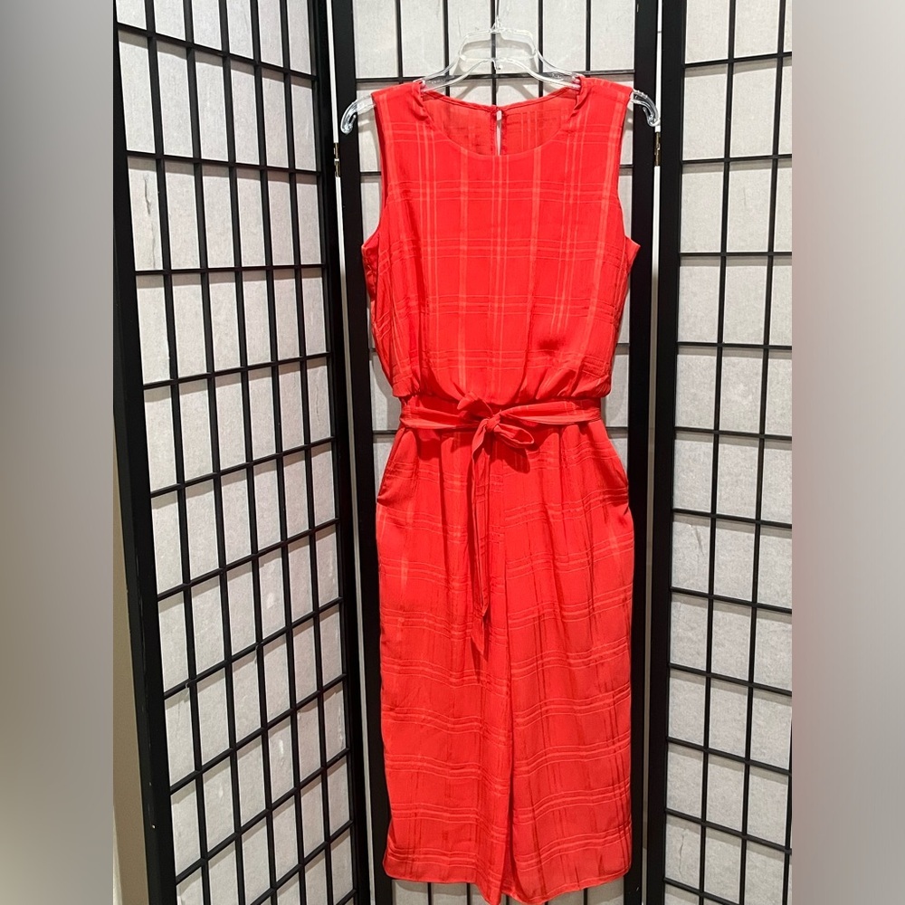 CORAL ORANGE SLEEVELESS GRID PATTERN ANKLE JUMPSUIT BY ENFOCUS STUDIO SIZE 8